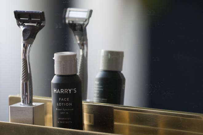 In this June 15, 2018, photo, the Winston razor and Harry's face lotion are on display at the headquarters of Harry's Inc., in New York. Armed with $112 million in new financing, the online startup that took on razor giants Gillette and Schick with its direct-to-consumer subscription model is investigating what other sleepy products might be ripe for disruption. (AP Photo/Mary Altaffer)