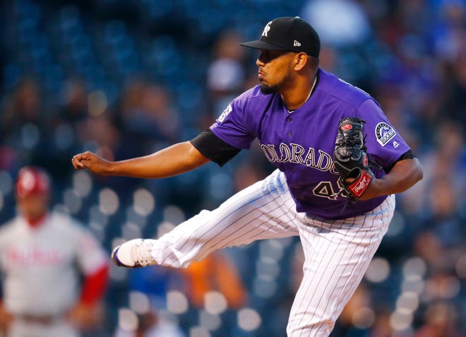 Colorado Rockies starting pitcher German Marquez works against the Philadelphia Phillies in the first inning of a baseball game Wednesday, Sept. 26, 2018, in Denver. (AP Photo/David Zalubowski)