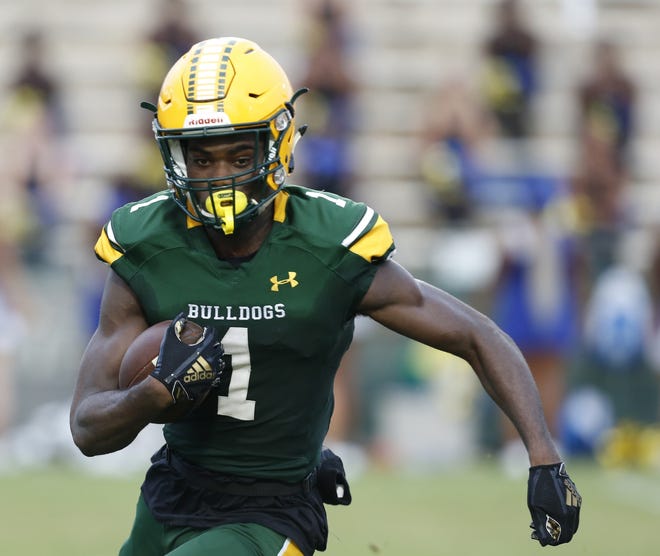 DeLand's Dionte Marks (1) leads the Volusia/Flagler area with 469 receiving yards and seven touchdowns. [News-Journal/Nigel Cook]
