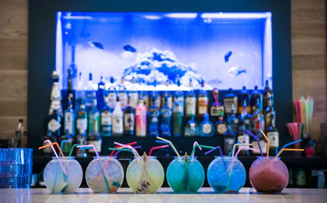 The fishbowl cocktails at Aquarium on Sixth are meant to be shared. [Contributed by the Four Seasons]