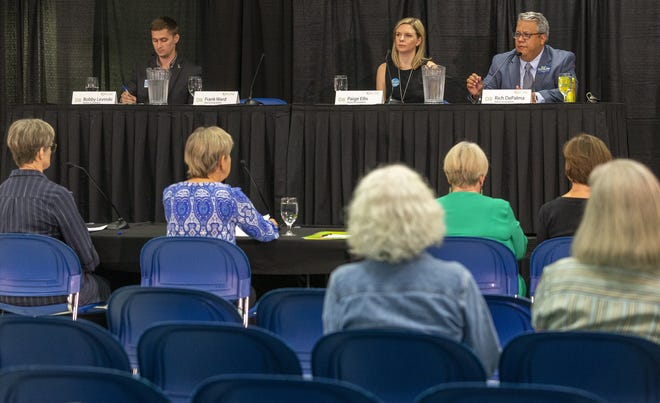 Bobby Levinski, left, Paige Ellis and Rich DePalma participate in a District 8 City Council candidate forum Thurday night at the South Austin Senior Activity Center. The trio are running to replace Council Member Ellen Troxclair. A fourth candidate, Frank Ward, did not attend the forum. [Stephen Spillman / For American-Statesman]