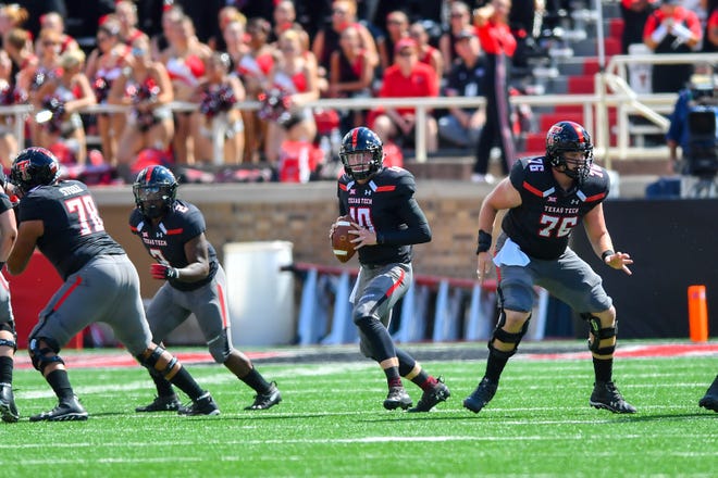 Texas Tech freshman quarterback Alan Bowman is 3-0 as a starter and leads the FBS with 389 yards passing per game. [John Weast/Getty Images]