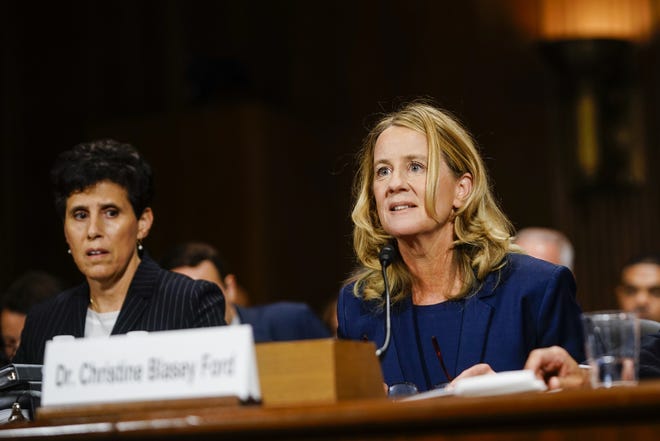 Christine Blasey Ford, with lawyer Debra S. Katz, left, answers questions at a Senate Judiciary Committee hearing on Thursday on Capitol Hill. [Photo by Melina Mara-Pool/Getty Images]