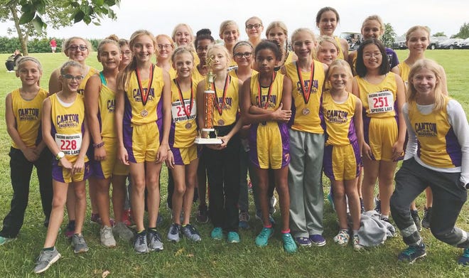 The Canton Ingersoll Middle School cross country teams both earned trophies at Wednesday’s Macomb Cross Country Invitational held at Spring Lake Park. The girls team won first place with a low score of 35 points as the Lady Giants had five runners finish in the top 10.