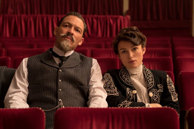 This image released Bleecker Street shows Dominic West, left, and Keira Knightley in a scene from "Colette." (Robert Viglasky/Bleecker Street via AP)