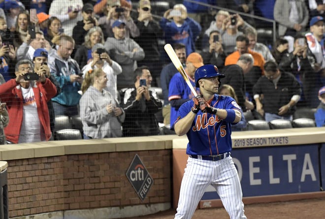 Fans take photos of New York Mets veteran David Wright as he waits to pinch-hit during the fourth inning Friday's game against the Miami Marlins at Citi Field. [THE ASSOCIATED PRESS]