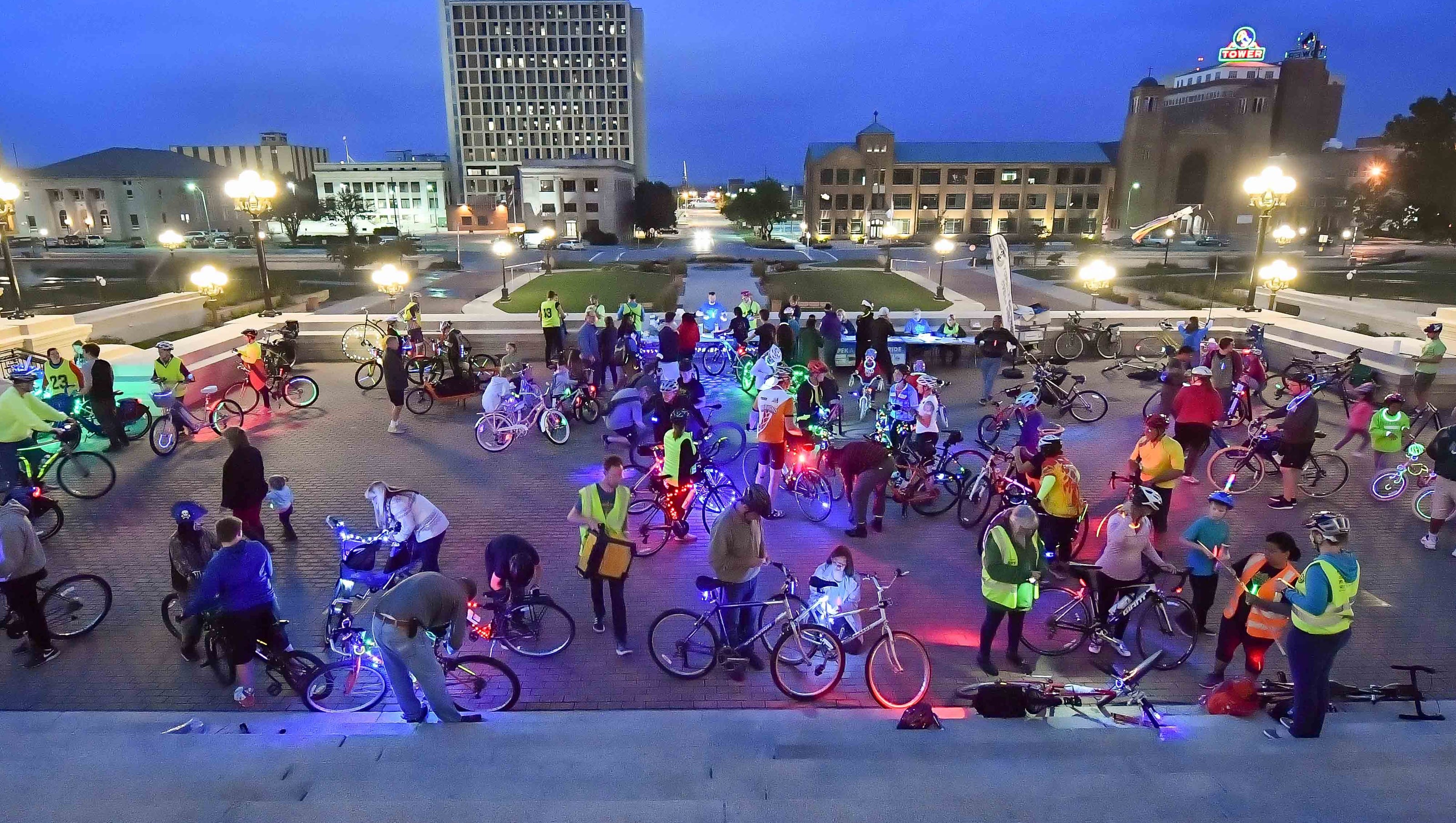 Hundreds of cyclists join glow ride