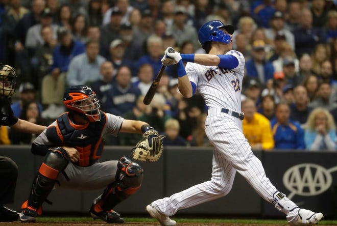 Milwaukee Brewers' Christian Yelich hits a two-run home run during the third inning of a baseball game against the Detroit Tigers Saturday, Sept. 29, 2018, in Milwaukee. (AP Photo/Morry Gash)