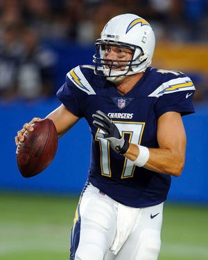 Los Angeles Chargers quarterback (17) Philip Rivers scrambles with the ball during the first quarter of a game against the Seattle Seahawks played at the StubHub Center in Carson, Calif. The San Francisco 49ers play the Los Angeles Chargers on Sunday, Sept. 30. (AP Photo/John Cordes, File)