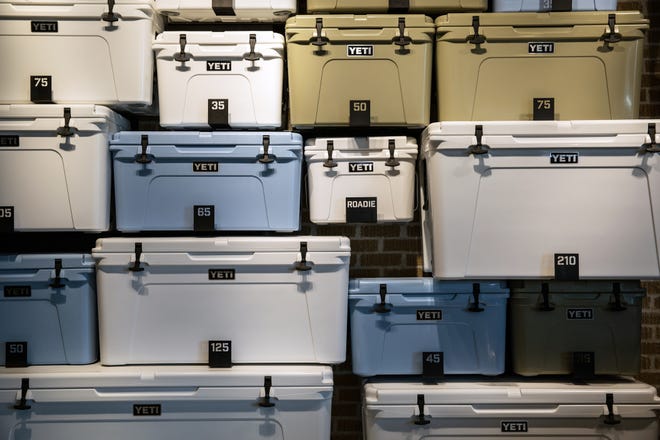 YETI coolers are arranged on a wall at the company's flagship store on South Congress Avenue. The store opened in February. [Tamir Kalifa/ AMERICAN-STATESMAN]