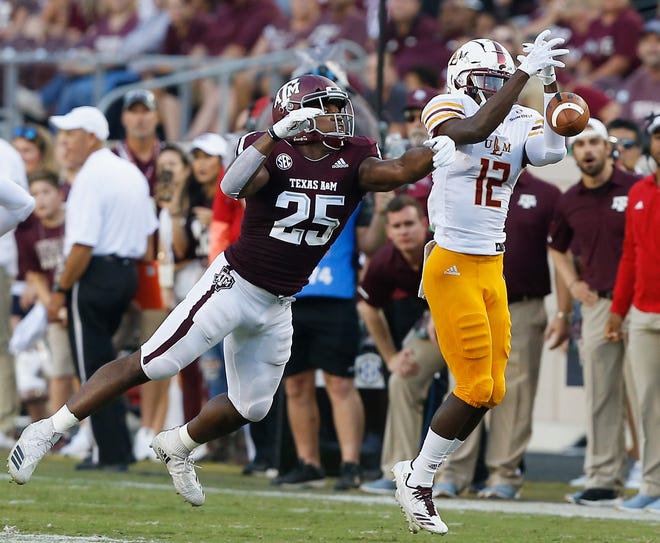 Texas A&M linebacker Tyrel Dodson (defending on a pass in the Louisiana-Monroe game) found himself in the middle of a controversy after Aggies coach Jimbo Fisher grabbed his facemask during the win over Arkansas. Video of the incident went viral over the weekend. [Bob Levey/Getty Images]