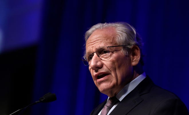 Pulitzer Prize-winning journalist and author Bob Woodward speaks at the annual gathering of the Rhode Island Public Expenditure Council on Monday night at the Rhode Island Convention Center. [The Providence Journal / Kris Craig]