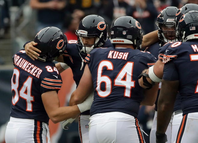 Chicago Bears quarterback Mitchell Trubisky, second from left, celebrates after throwing a touchdown pass against the Tampa Bay Buccaneers during the first half Sunday, Sept. 30, 2018, in Chicago. Trubisky had six TD passes on the day. [NAM Y. HUH/THE ASSOCIATED PRESS]