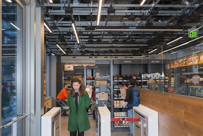 The Amazon Go store in Seattle. The e-commerce giant uses its headquarters city as a living laboratory, trying out new retail and logistics models.   [Eirik Johnson / The New York Times]