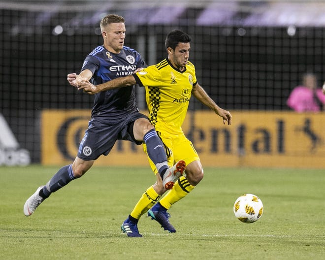Crew SC's Milton Valenzuela is fouled by New York City FC's Alexander Ring in a game last month. Valenzuela, acquired on loan from a club in Argentina in January, turned 20 in August. [Greg Bartram]