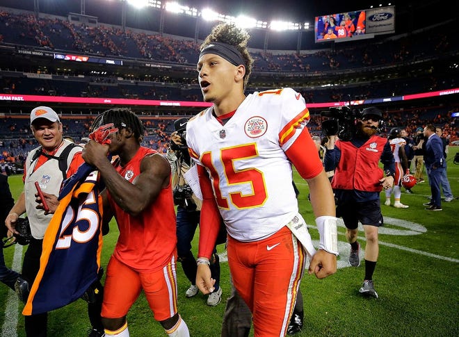 Kansas City Chiefs quarterback Patrick Mahomes (15) leaves the field after an NFL football game against the Denver Broncos Monday in Denver. The Chiefs won 27-23. [JACK DEMPSEY/ASSOCIATED PRESS]