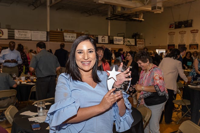 Ana Loyoza was the 2018 Hispanic Woman of the Year Award recipient at the Hispanic Heritage Luncheon held Wednesday at Amarillo Wesley Community Center. [Shaie Williams/For the Amarillo Globe-News]
