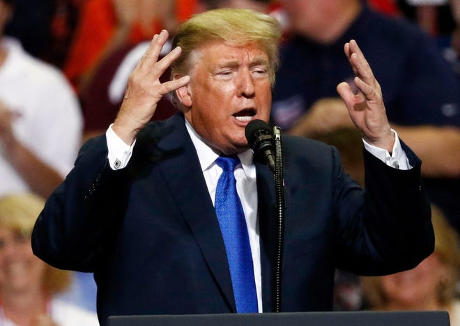 President Donald Trump gestures as he speaks at a rally Tuesday, Oct. 2, 2018, in Southaven, Miss. (AP Photo/Rogelio V. Solis) ORG XMIT: MSRS124 Donald Trump

Rogelio V. Solis