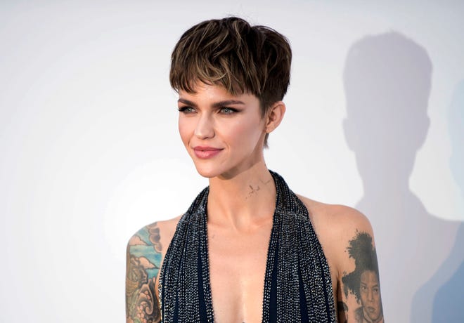 FILE - This May 17, 2018 file photo shows actress Ruby Rose at the amfAR, Cinema Against AIDS, benefit during the Cannes Film Festival, in Cap d'Antibes, southern France. Cybersecurity firm McAfee crowned Rose the most dangerous celebrity on the internet on Tuesday, Oct. 2. No other celebrity is more likely to land users on websites that carry viruses or malware. (Photo by Arthur Mola/Invision/AP, File)