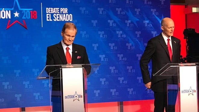 Bill Nelson and Rick Scott during the Telemundo 51 WSCV debate on Tuesday, October 2, 2018.