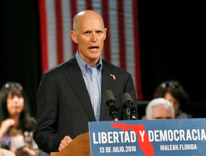 Gov. Rick Scott, who is challenging incumbent Bill Nelson in the U.S. Senate race, speaks to supporters at a campaign stop on July 13 in Hialeah. [AP Photo / Wilfredo Lee]