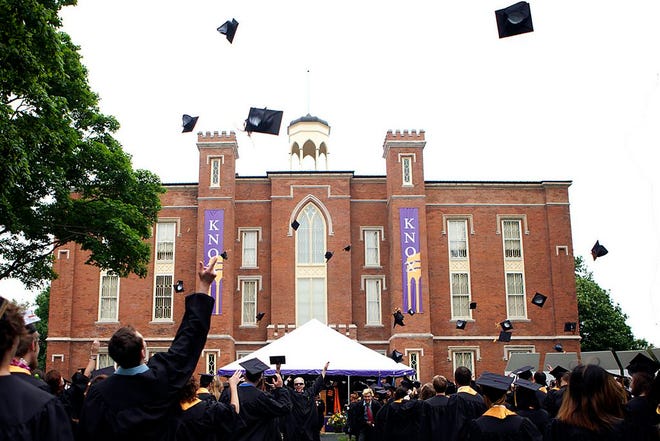 Knox College graduates throw their caps during a commencement ceremony at Old Main. Old Main, located on the Knox College campus in Galesburg, is the only existing site from the seven debates between Abraham Lincoln and Stephen Douglas in 1858. The college continues to use the building for classes and offices.