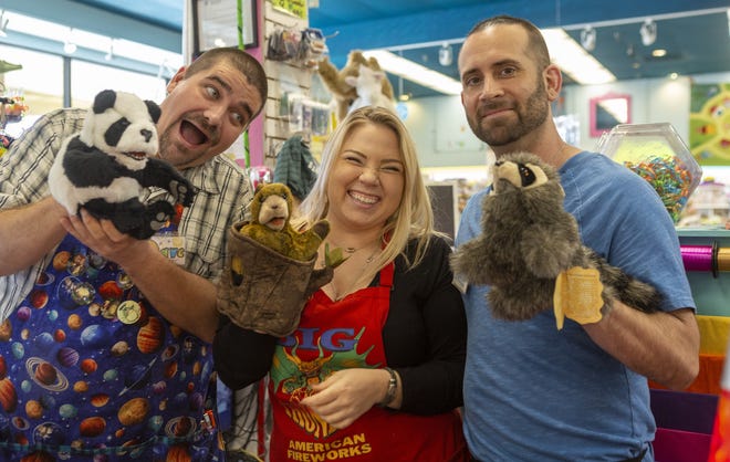 Employees Dave Weber, left, Sylvia Edwards and Ryan Obermeyer pose for a photo in Terra Toys at 2438 W Anderson Lane, Wednesday, Oct. 3, 2018. [Stephen Spillman for American-Statesman]