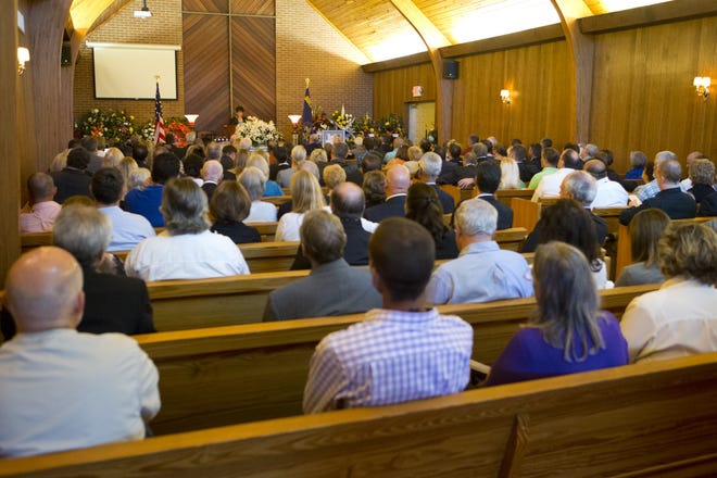 Wilson Funeral Home was packed Friday for the funeral of Bay County businessman Charles Hilton. [JOSHUA BOUCHER/THE NEWS HERALD]