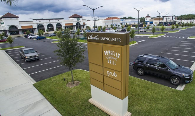 Butler Town Center, which is just off of Archer Road between Southwest 34th Street and Interstate 75, has Whole Foods as a tenant along with a few other restaurants and more retailers on the way. [PHOTO BY DOUG ENGLE]