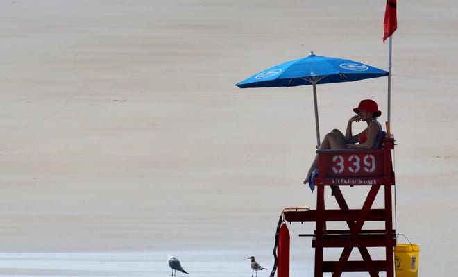 For years, moving a lifeguard tower like this one was an offense that could wind up on your criminal record. The Volusia County Council made changes to the classificaton of several ordinances recently so that violators don't have to go to criminal court. [News-Journal File]