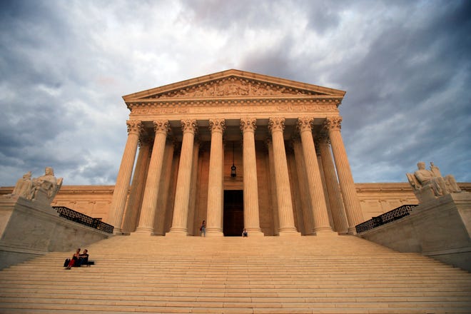 The U.S. Supreme Court is seen at near sunset in Washington, Thursday, Oct. 4, 2018. [AP PHOTO/MANUEL BALCE CENETA]