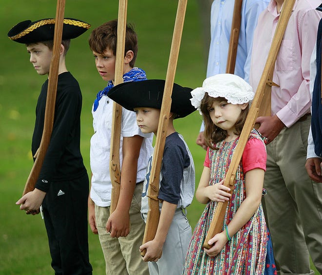 Young militia members from left, Jack Leahy,11, Evan Concannon,10, Anthony DeMarco,8 and Kate Leahy,7 all of Marshfield on Sunday Oct. 7, 2018 Greg Derr/The Patriot Ledger
