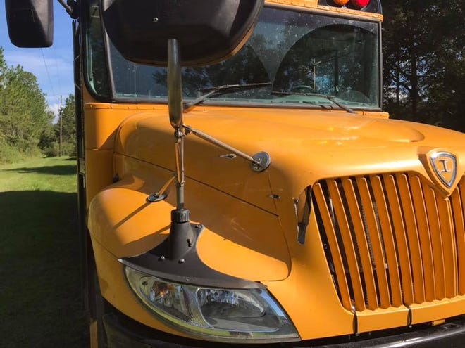 A bullet struck this empty school bus early Sunday during a shootout involving Bradford County sheriff's deputies. The bus was parked on the property of the man who was killed. [Bradford County Sheriff's Office via Facebook]