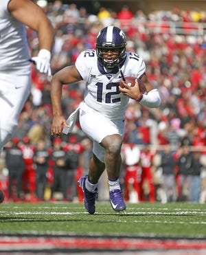 TCU quarterback Shawn Robinson passed for 85 yards and rushed for 84 yards last year in a 27-3 win at Texas Tech. Robinson's dealing with an injury to his non-throwing shoulder going into this week's Tech-TCU game. [AP Photo/Brad Tollefson]