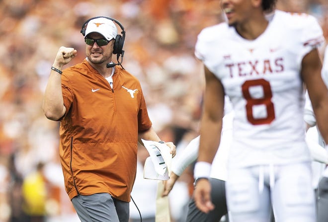 Texas coach Tom Herman pumps his fist after a touchdown during the Longhorns' 48-45 win over Oklahoma Saturday. The win vaulted Texas to the top of the Statesman's Big 12 Power Poll. [Nick Wagner/American-Statesman]