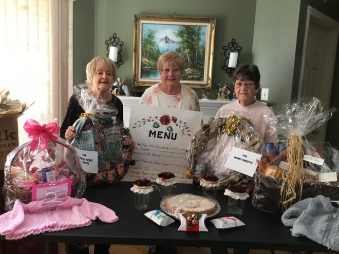 From left, Chris Erban, Geri Grigas and Joan Divoll display some of the items that will be found at this year’s Fall Fair on Oct. 13. [SUBMITTED PHOTO]
