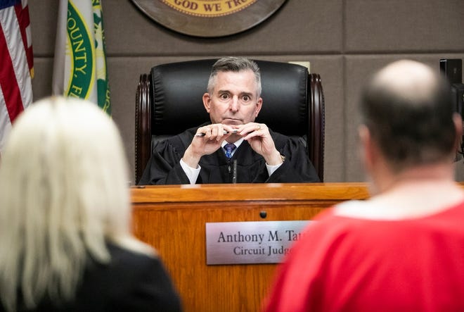 Judge Anthony Tattti listens to defendant Jose Manuel Martinez, who is charged with two counts of first-degree murder and facing the death penatly, and his attorney, discuss the status of the case during a recent hearing. Tatti is on the list of 59 names the Supreme Court Judicial Nominating Committee will consider for three open spots on the court. [File]