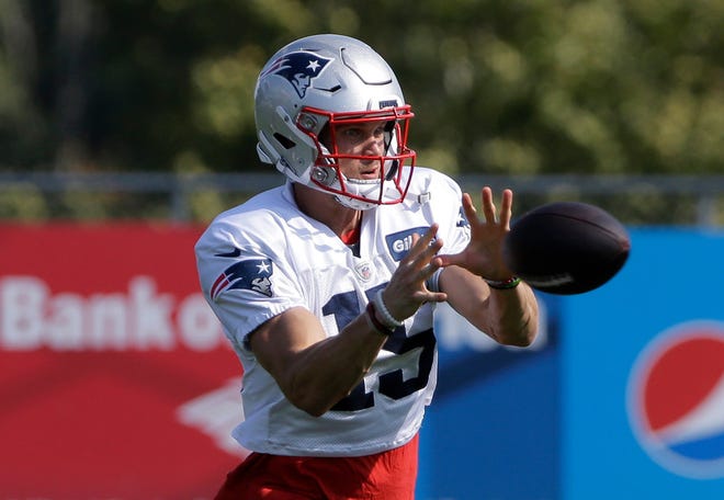 Chris Hogan, catching a pass during Wednesday's practice, is nursing a thigh injury.