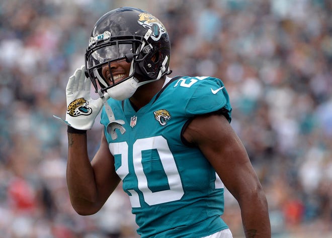 Jacksonville Jaguars cornerback Jalen Ramsey (20) reacts after a play during the first half of an NFL football game against the New England Patriots in Jacksonville, Fla.