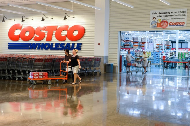 Shoppers exit Costco at Westfield Sarasota Square mall on Thursday, Oct. 17, 2013. [Herald-Tribune archive]