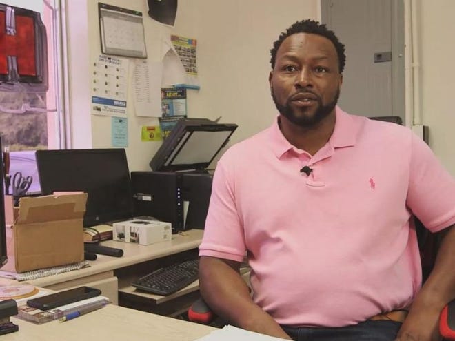 Keith Ivey runs a used-car dealership with his father in Jacksonville, but a felony conviction in his past blocks his opportunity to vote. He hopes an amendment on the November ballot will change that. (Submitted photo via News Service of Florida)