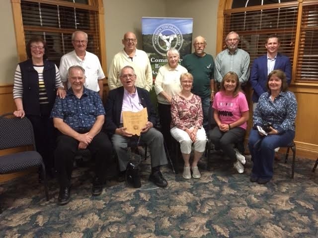 The Community Business Association of northern Tuscarawas County honored Dick Lebold, of Bolivar, at the TakeExit93 Business Networking Mixer held Oct. 2 at Wilkshire Banquet Center in Bolivar. Pictured, from left, back row, are Barbara Scott, Ron Deal, Paul Worley, Judy Meiser, Chuck Meiser, Gary Baker and Justin Wallace; front, Mark Scott Sr., Lebold, Candy Baker, Terri Davis and Holly Thouvenin. PHOTO PROVIDED