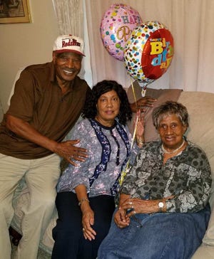 Esther Williamson (right) celebrates her 103rd birthday with her son Harold and daughter-in-law Elaine. [Special to The Star]