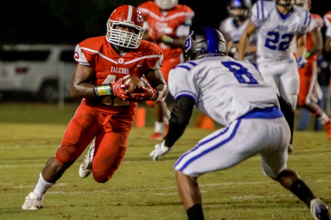 Seventy-First's Devante Wedlock had two rushing scores, 10 tackles and a forced fumble in last night's game against Scotland. [Raul F. Rubiera/The Fayetteville Observer]
