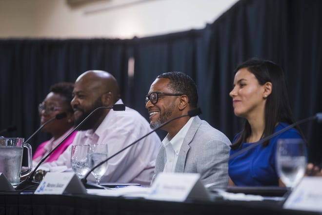 Four of the seven candidates campaigning for the District 1 seat on the Austin City Council -- from left to right, Natasha Harper-Madison, Lewis Conway Jr., Reedy Spigner and Mariana Salazar -- participate in a forum in early September. [AMANDA VOISARD / AMERICAN-STATESMAN]