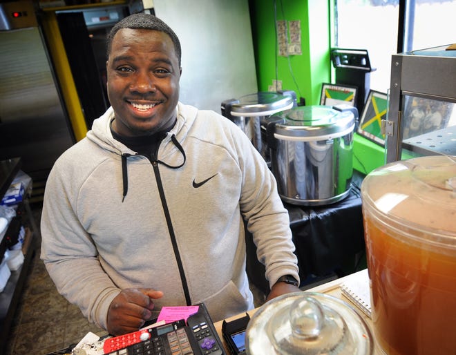 Kavelle Gordon is co-owner (with his brother Antoine Brathwaite and mother, Ophelia Powell) of Auntie Rita’s Jamaican Cuisine, 1315 S. Santa Fe. [TOM DORSEY / SALINA JOURNAL]