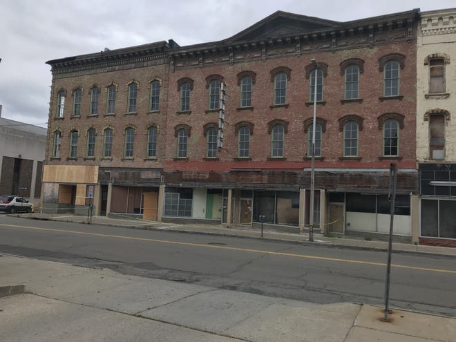Work on a $9 million project upgrading two vacant historic building near the corner of Carroll Street in downtown Elmira may start in early 2019. [Jeff Smith/The Leader]