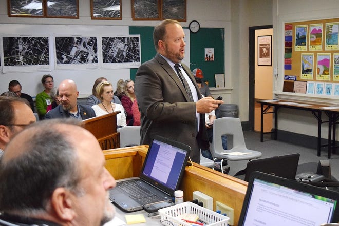 James Fauvre, PBK project manager of the Smithville school district bond projects construction, gives an update to the school board at the Oct. 15 school board meeting. [FRAN HUNTER/ FOR SMITHVILLE TIMES]