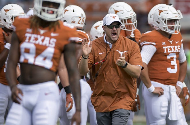 Texas coach Tom Herman warms up his team before the Baylor game at Royal-Memorial Stadium. The Longhorns are one of only two teams in the country that are 3-0 vs. ranked teams. [JAY JANNER/AMERICAN-STATESMAN]