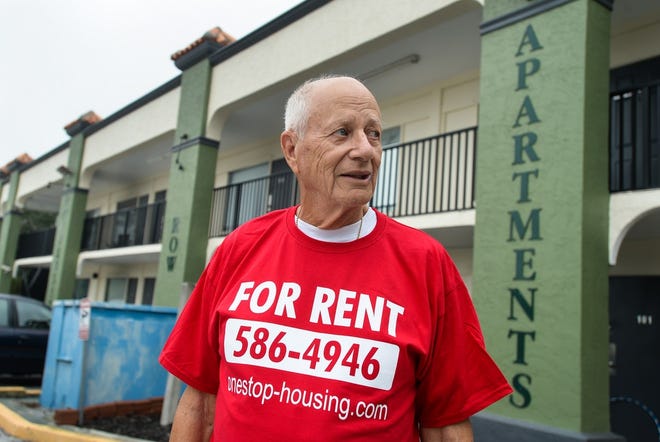 The late affordable housing champion Harvey Vengroff, outside one of his rental complexes on the North Trail. [Herald Tribune staff photo by Dan Wagner]